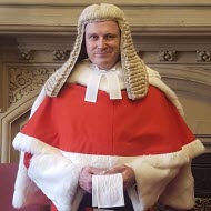 The Honourable Mr Justice 